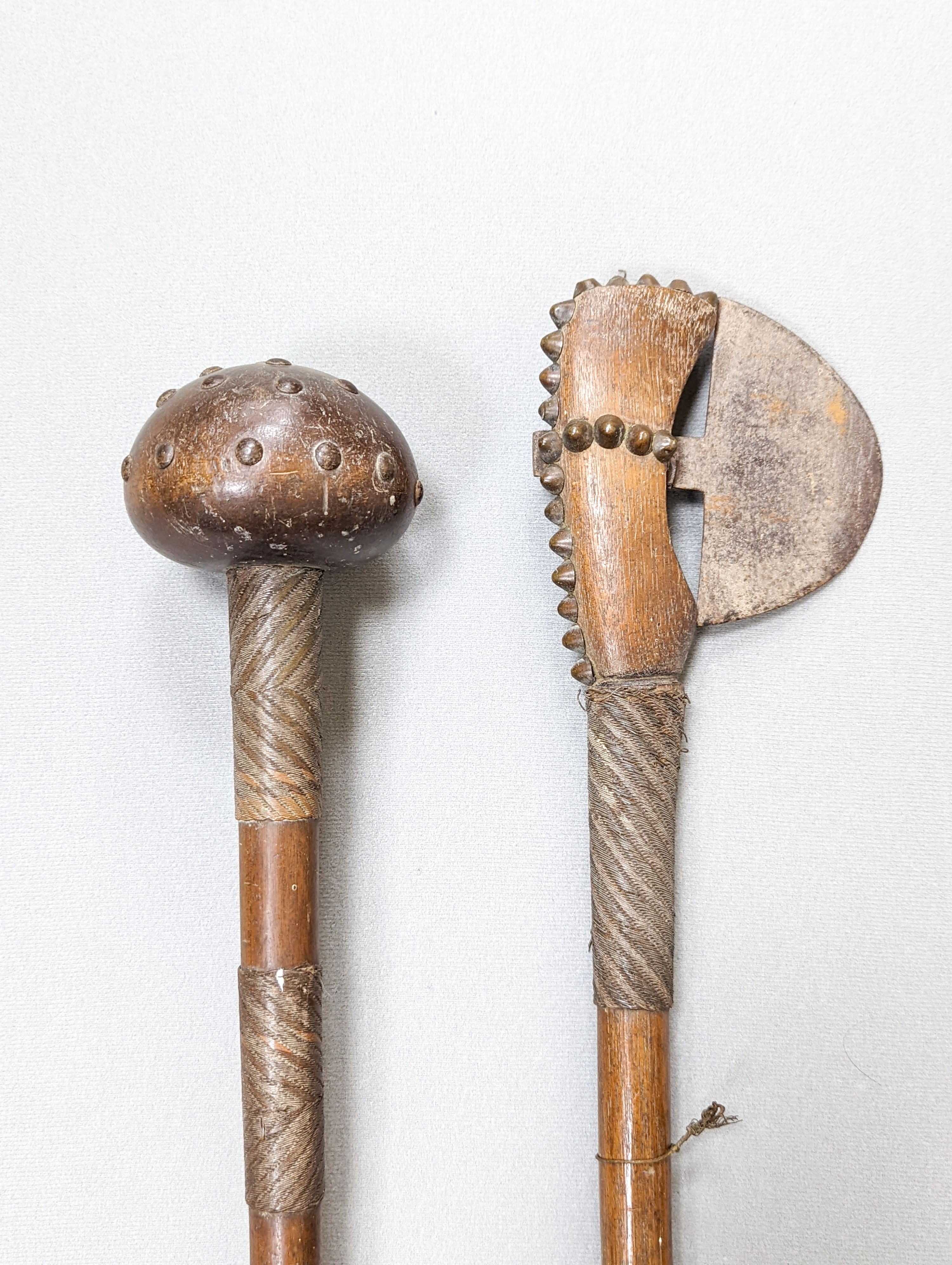 A Zulu hardwood, braided wire and studded knobkerrie and a similar axe 79cm